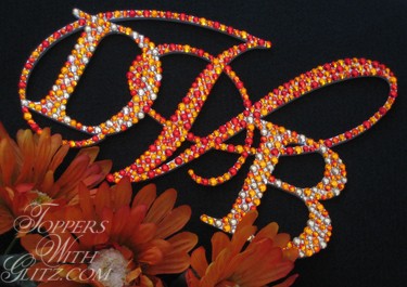 Welded monogram cake topper with crystals